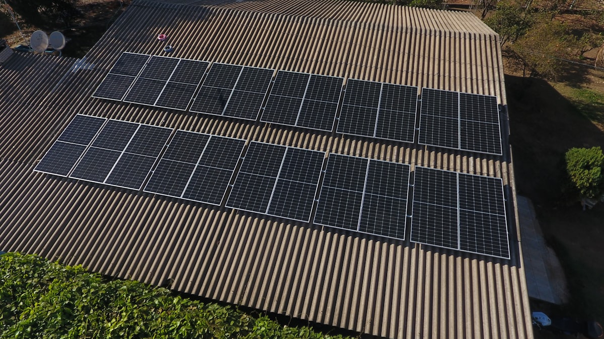 Rooftop solar panel array installed on a corrugated metal roof
